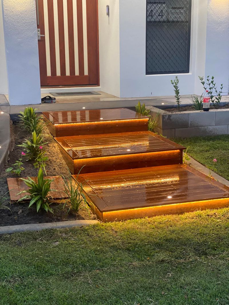Timber deck steps with LED strip lighting Brisbane landscaping
